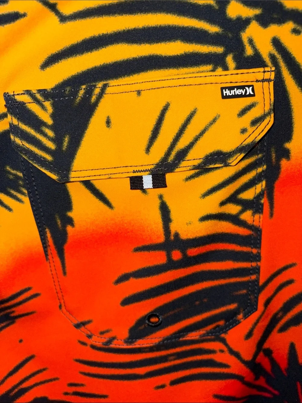 Hurley Black Boardshorts with Yellow-Orange-Red Tropical Print